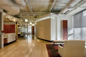 Non-Profit Corporate Interior Design Houston Curved Corridor Walls Venetian Plaster White and Red