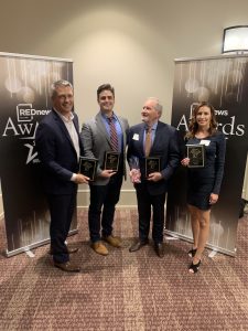 Abel Design Group Accepts REDNews 2020 Award