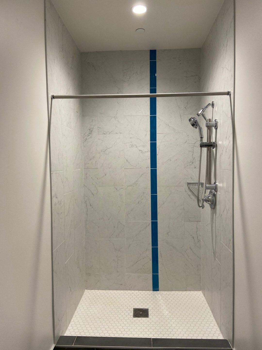 Houston Architecture Building Repositioning 1415 LOUISIANA FITNESS CENTER Houston Corporate Interior Design Shower