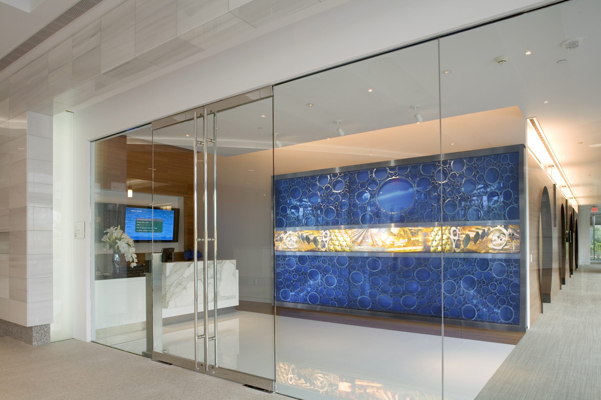 Corporate Interior Design LEED V&M Tubes Houston Reception Lobby Blue Accent Wall